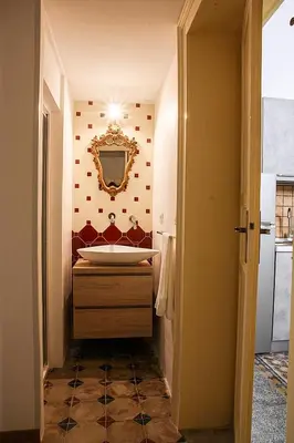 Letto o letti in una camera di PALAZZO NICASTRO gh - Red House apartment