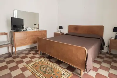 Letto o letti in una camera di Casa Concetta