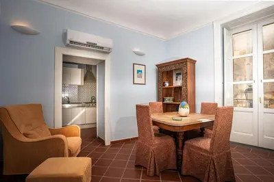 Area soggiorno di I Tre Balconi di Via Roma Apartment