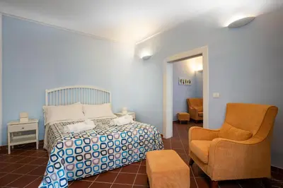 Letto o letti in una camera di I Tre Balconi di Via Roma Apartment
