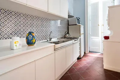 Cucina o angolo cottura di I Tre Balconi di Via Roma Apartment