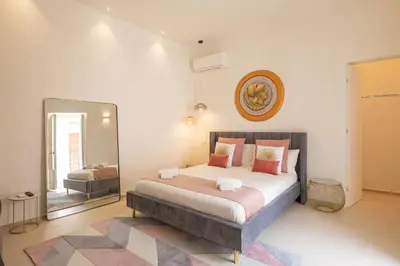 Letto o letti in una camera di Amate Case by Ortigia Apartments