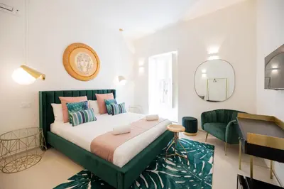 Letto o letti in una camera di Amate Case by Ortigia Apartments