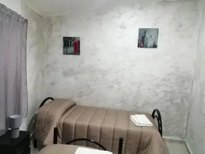 Letto o letti in una camera di Case Serena vacanze relax