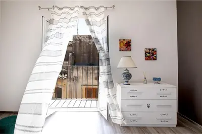 Letto o letti in una camera di Le Terrazze sui Tetti di Noto by Wonderful Italy