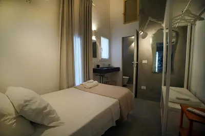 Letto o letti in una camera di Casa Lunya