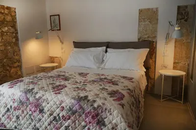 Letto o letti in una camera di Casa Lunya