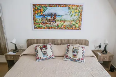 Letto o letti in una camera di Domus Ursino