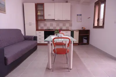 Cucina o angolo cottura di Case Arcobaleno Marzamemi