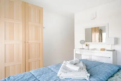 Letto o letti in una camera di Eos Sea View Apartments