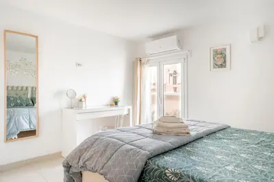 Letto o letti in una camera di Eos Sea View Apartments