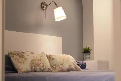 Letto o letti in una camera di VHOME Exclusive Living Room