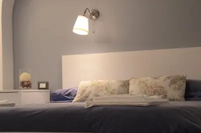 Letto o letti in una camera di VHOME Exclusive Living Room
