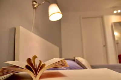 Letto o letti in una camera di VHOME Exclusive Living Room