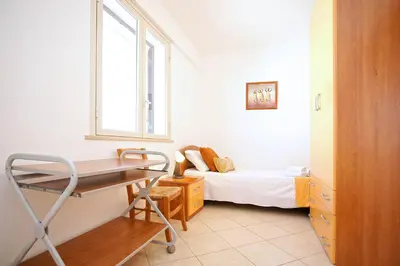 Letto o letti in una camera di CASA LUCA Appartamento al centro di Marzamemi vista mare con parcheggio privato