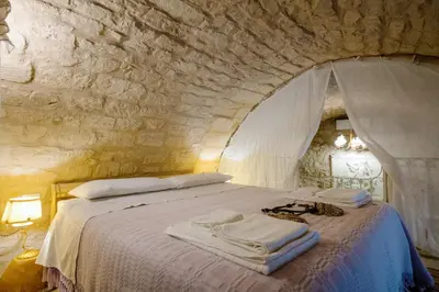 Letto o letti in una camera di Le Cacinare