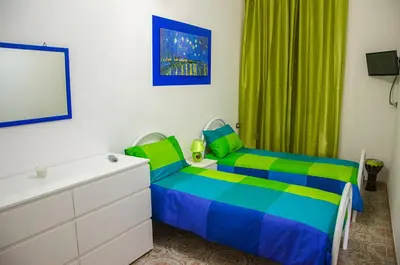 Letto o letti in una camera di B&B Epicarmo