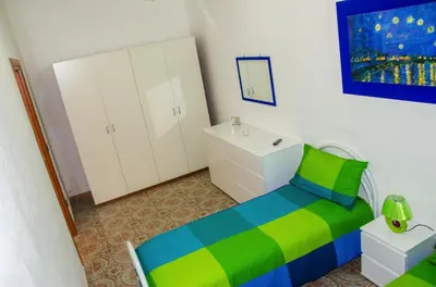 Letto o letti in una camera di B&B Epicarmo