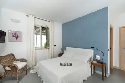 Letto o letti in una camera di Stella Maris