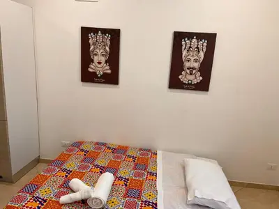 Letto o letti in una camera di Esse House Noto