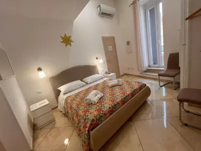 Letto o letti in una camera di Esse House Noto