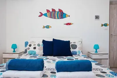 Letto o letti in una camera di Attico in pieno centro storico di Catania