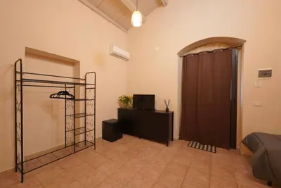 Letto o letti in una camera di Antica Dimora Siracusa
