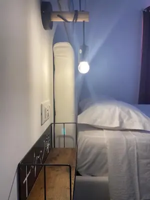 Letto o letti in una camera di B&B Libertà
