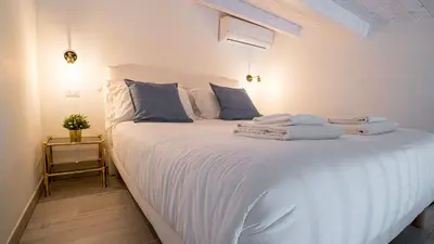 Letto o letti in una camera di Piccola Luna Cozy Home