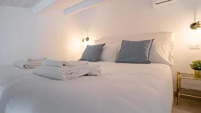 Letto o letti in una camera di Piccola Luna Cozy Home