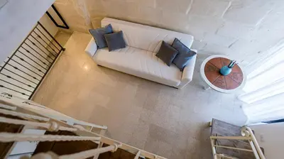 Area soggiorno di Piccola Luna Cozy Home