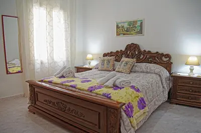 Letto o letti in una camera di Casa Celeste 2