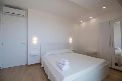 Letto o letti in una camera di Charming House Truvatura - Sicilia Vacanza