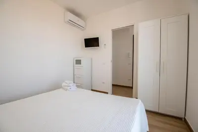 Letto o letti in una camera di Charming House Truvatura - Sicilia Vacanza
