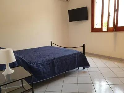 Letto o letti in una camera di Appartamento Ionios