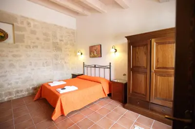 Letto o letti in una camera di Agriturismo Serrafiori