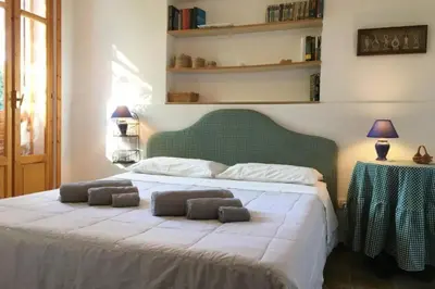 Letto o letti in una camera di Villa dei Pioppi