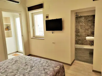 TV o dispositivi per l'intrattenimento presso Edesia Apartment- Ortigia Holidays