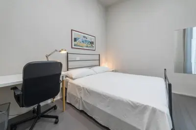 Letto o letti in una camera di Residenza Archimede