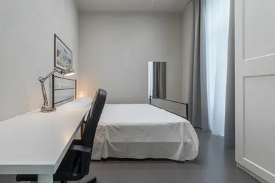 Letto o letti in una camera di Residenza Archimede