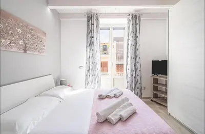 Letto o letti in una camera di LA CASA DEL CORSO