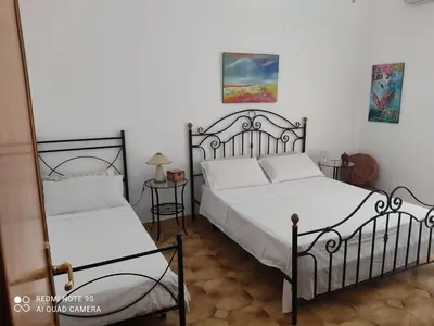 Letto o letti in una camera di Amanda casa vacanza