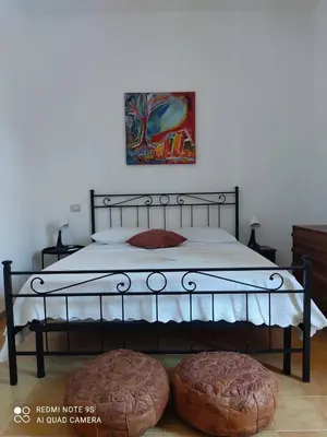 Letto o letti in una camera di Amanda casa vacanza