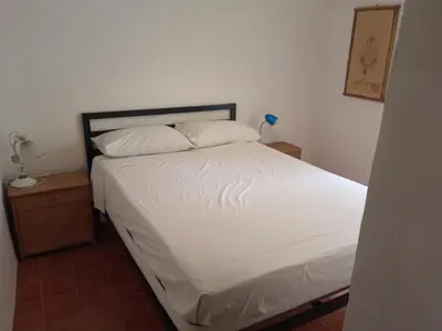Letto o letti in una camera di Maison à la mer Casamare