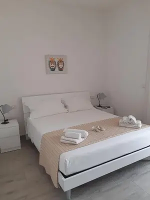 Letto o letti in una camera di Fronte Mare