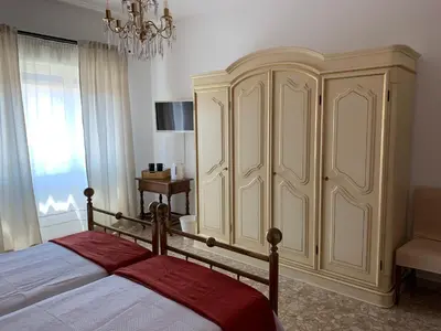 Letto o letti in una camera di B&B Fiorisol