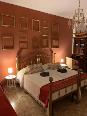 Letto o letti in una camera di B&B Fiorisol