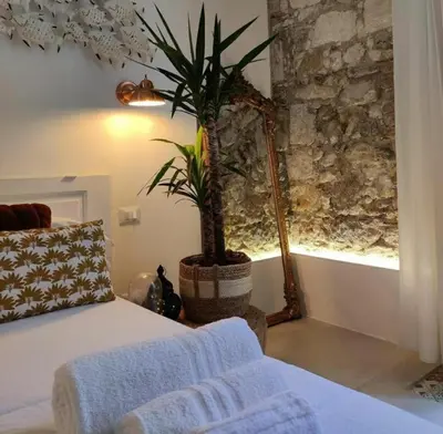 Letto o letti in una camera di Calamùrn Ortigia