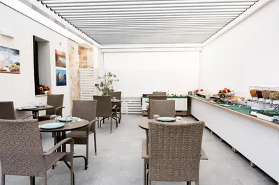 Area soggiorno di Elaia Rooms