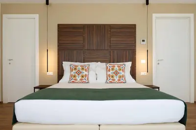 Letto o letti in una camera di Elaia Rooms